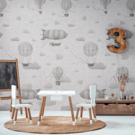 Elegant nursery interior showing the oversized grey balloon mural covering the main wall to establish a restful focal point.
