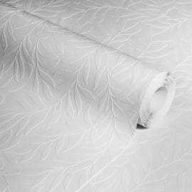Studio photograph of the white trailing leaf wallpaper roll highlighting the deep relief of the luxury textured vinyl.